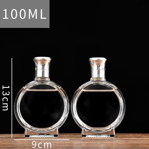 Chai tròn dẹp nắp bạc 100ml